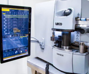 Testing equipment hooked up to a vertical monitor showing charts and graph readouts